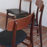 3 chaises scandinaves Farstrup modèle 217 en teck et skaï noir, design danois des années 60.