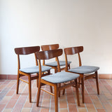 4 chaises scandinaves Farstrup en teck avec assise en tissu gris, design danois des années 60.