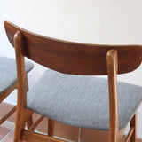 4 chaises scandinaves Farstrup en teck avec assise en tissu gris, design danois des années 60.
