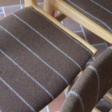 4 chaises scandinaves Farstrup en hêtre clair avec assise et dossier en tissu brun rayé, design danois années 70.