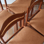 Lot de 4 chaises scandinaves en teck années 60 avec assises retapissées tissu terracotta