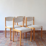 Lot de 4 chaises vintage en hêtre clair, assise bouclette beige. Style scandinave années 60, chic et confortable.