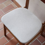 Six chaises scandinaves en hêtre et dossier teck, fabrication danoise des années 60, retapissées en bouclette écrue.