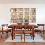 Six chaises Farstrup en teck des années 60 avec assises retapissées ton chaud et dossier galbé scandinave.