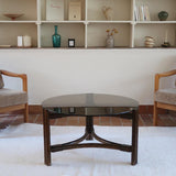 Table basse ronde en rotin et verre fumé — années 70