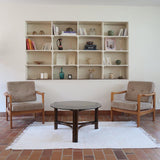 Table basse ronde en rotin et verre fumé — années 70