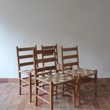 Série de 4 chaises rustiques en bois et assise paillée — années 60