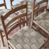 Série de 4 chaises rustiques en bois et assise paillée — années 60