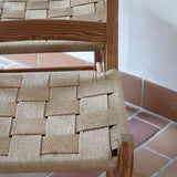 Série de 4 chaises rustiques en bois et assise paillée — années 60