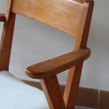 Paire de fauteuils vintage en bois et assise retapissée — années 60