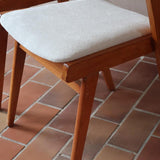 Paire de fauteuils vintage en bois et assise retapissée — années 60