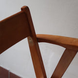 Paire de fauteuils vintage en bois et assise retapissée — années 60