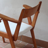 Paire de fauteuils vintage en bois et assise retapissée — années 60