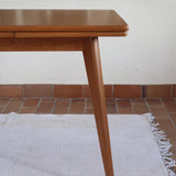 Table à manger scandinave extensible en placage de chêne — années 60