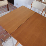 Table à manger scandinave extensible en placage de chêne — années 60