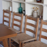 Série de 4 chaises rustiques en bois et assise paillée — années 60