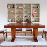 Table Art déco en bois massif avec piétement architectural, design européen des années 1940.