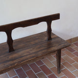 Banc rustique ancien bois massif chantourné, dossier ajouré montants festonnés, assise planche pleine patinée, mobilier vernaculaire français campagne