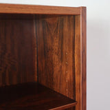 Bibliothèque scandinave vintage en palissandre de Rio signée Poul Hundevad, années 60, avec deux colonnes d’étagères réglables et piètement compas, estampillée Danish Furnituremakers Control.