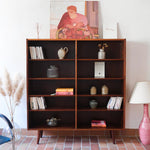 Bibliothèque scandinave vintage en palissandre de Rio signée Poul Hundevad, années 60, avec deux colonnes d’étagères réglables et piètement compas, estampillée Danish Furnituremakers Control.