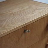 commode scandinave chêne clair poignées rondes danemark années 70 design nordique