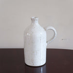 Cruchon grès émaillé Graessel Potiers d'Alsace vintage, blanc cassé moucheté brun effet pierre, anse arrondie, signature gravée, artisanat alsacien
