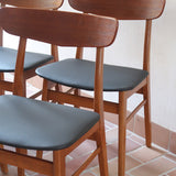 Ensemble 6 chaises scandinaves Farstrup teck années 60, dossiers teck courbé bandeau, structures bois clair, assises skaï noir refaites, danois mid-century