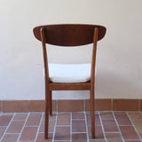 Suite de 6 chaises scandinaves vintage années 60, dossier galbé en teck, structure hêtre, assises retapissées en bouclette blanche