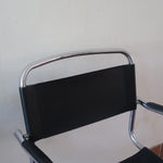 Fauteuil cantilever vintage chrome skaï noir – style Bauhaus