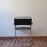 Fauteuil cantilever vintage chrome skaï noir – style Bauhaus