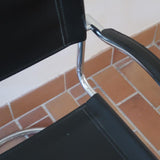 Fauteuil cantilever vintage acier chromé skaï noir – style Bauhaus