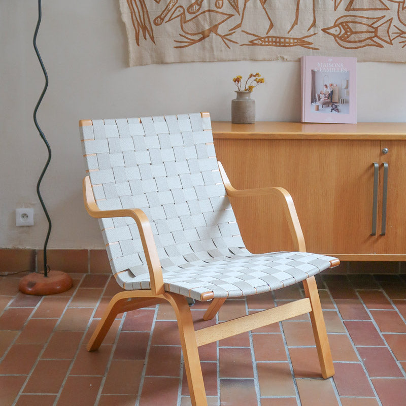 Fauteuil lounge en chêne avec assise et dossier en sangles tissées claires, design danois années 50