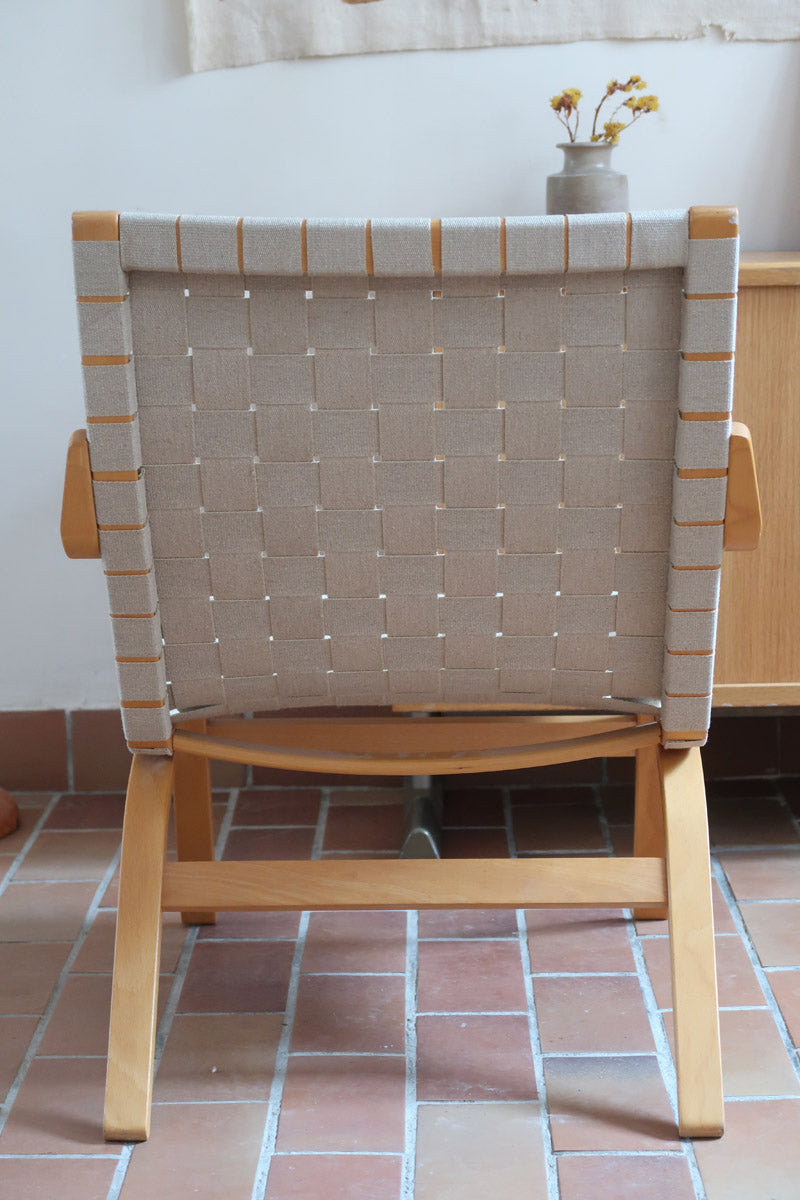 Fauteuil lounge en chêne avec assise et dossier en sangles tissées claires, design danois années 50