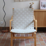 Fauteuil lounge en chêne avec assise et dossier en sangles tissées claires, design danois années 50