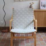 Fauteuil lounge en chêne avec assise et dossier en sangles tissées claires, design danois années 50