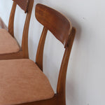 Paire de chaises scandinaves Farstrup en teck avec assise retapissée en tissu terracotta, design danois des années 60.