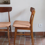 Paire de chaises scandinaves Farstrup en teck avec assise retapissée en tissu terracotta, design danois des années 60.