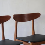 Paire de chaises scandinaves Farstrup vintage en teck et skaï noir neuf