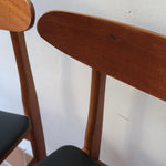 Paire de chaises scandinaves Farstrup vintage en teck et skaï noir neuf