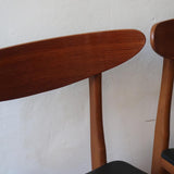 Paire de chaises scandinaves Farstrup vintage en teck et skaï noir neuf