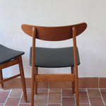 Paire de chaises scandinaves Farstrup vintage en teck et skaï noir neuf
