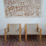 Paire de fauteuils vintage modernistes en hêtre clair et toile beige – années 70