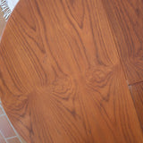 Table à manger ronde extensible en teck Sorø Stole avec deux rallonges, fabriquée au Danemark, pieds fuselés.
