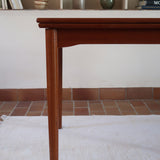 Table à manger scandinave extensible en teck années 60, allonges papillon, pieds fuseau, jusqu'à 10 couverts