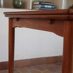 Table à manger scandinave extensible en teck années 60, allonges papillon, pieds fuseau, jusqu'à 10 couverts