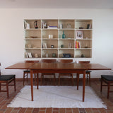 Table à manger scandinave extensible en teck années 60, allonges papillon, pieds fuseau, jusqu'à 10 couverts