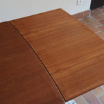Table à manger scandinave extensible en teck, design danois des années 60, en très bon état.