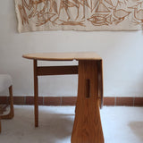 Table Ercol drop leaf en bois massif clair, plateau ovale à abattants, années 70.