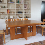 Table à manger extensible vintage en bois d'orme massif, Meubles Seltz, années 90, piétement à deux panneaux pleins en T reliés par une traverse basse, deux rallonges d'about passant de 160 à 250 cm, démontable