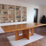 Table à manger extensible vintage en bois d'orme massif, Meubles Seltz, années 90, piétement à deux panneaux pleins en T reliés par une traverse basse, deux rallonges d'about passant de 160 à 250 cm, démontable